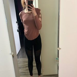 Black leggings with mesh, from Fabletics size medium.